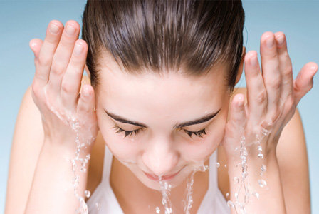 woman-washing-face