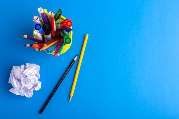 top-view-different-colorful-pencils-with-felt-pens-blue-desk_140725-65863