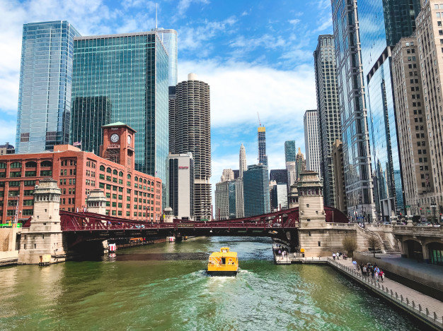 beautiful-wide-shot-chicago-river-with-amazing-modern-architecture_181624-3897