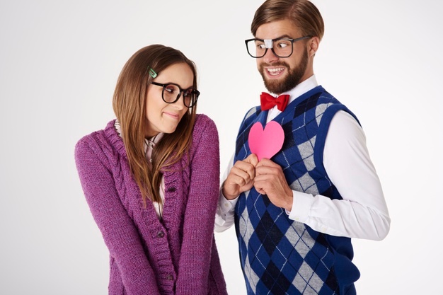 young-funny-looking-geek-couple-having-fun-isolated_329181-16220