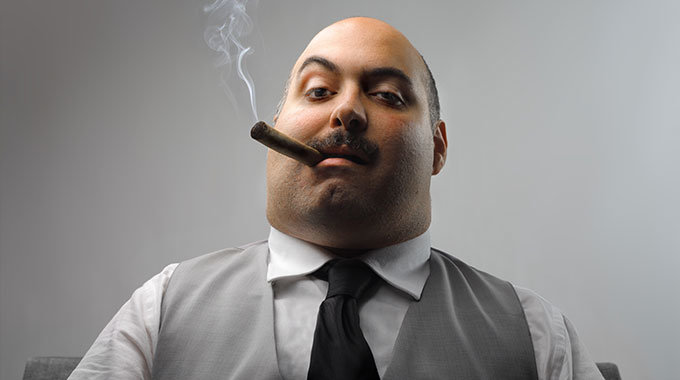 boss-fat-guy-smoking-cigar-in-suit