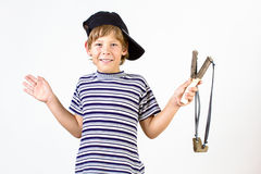 boy-slingshot-striped-shirt-baseball-cap-holding-hands-34102501